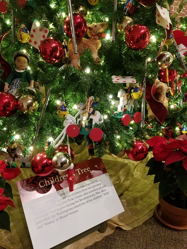 Close up of themed ornaments on Children's Tree