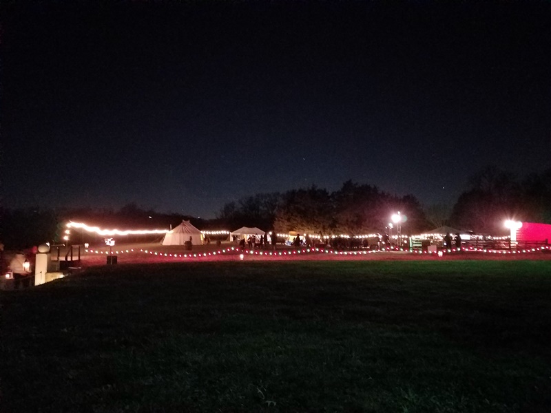Distant view of the lighted vendors area at Mount Vernon